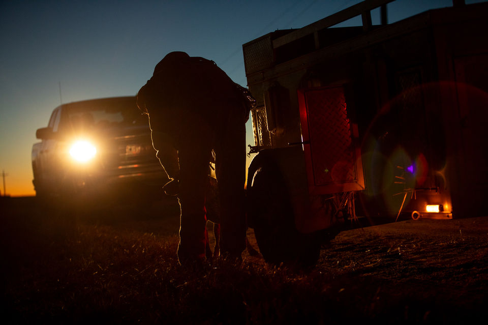 Outdoor photographer: Virginia commercial photographer: Early morning pheasant hunter gets his dog ready to hunt.