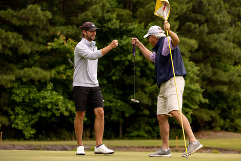 Tourism Photographer: two friends golfing in Franklin Southampton, VA. Kyle LaFerriere