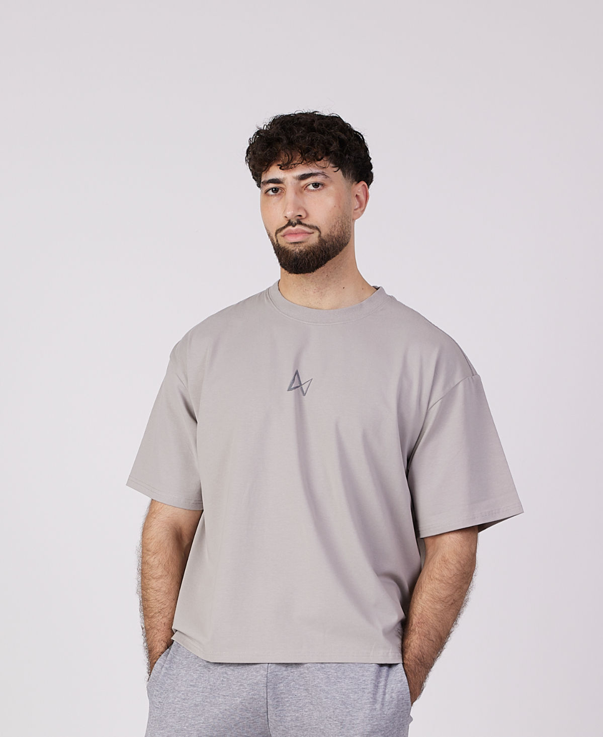 Man wearing the Grey Matter Oversized Tee