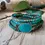 Thumbnail: Handmade 4/5 wrap bracelet with turquoise and Shoushan beads, featuring a flower closure and adjustable vegan-friendly waxed