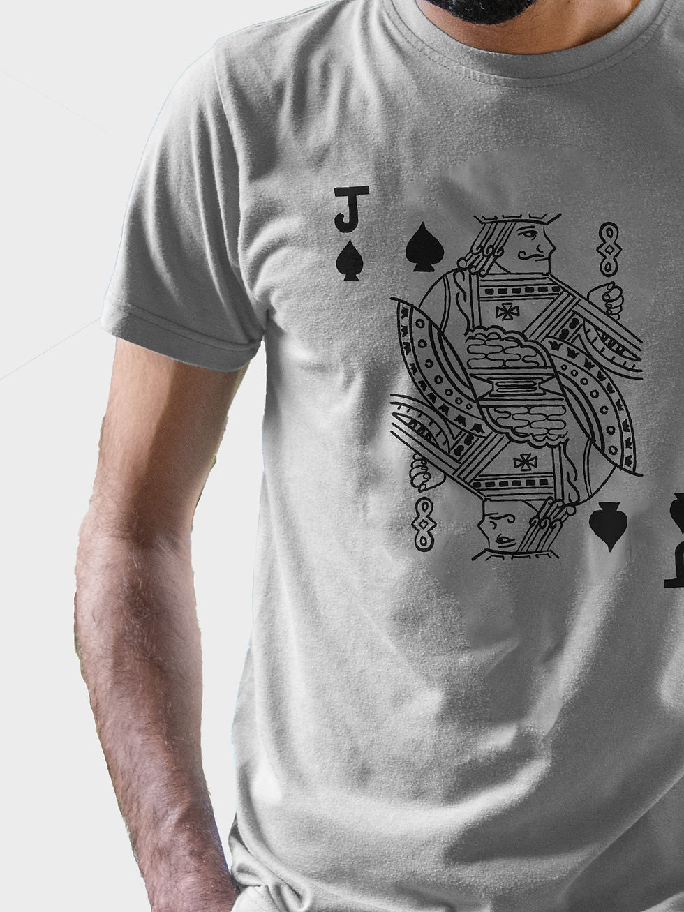 Close up view of a person wearing a grey t-shirt with a graphic on it