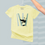 Thumbnail: Hand holding a t-shirt on a hangar