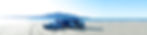 Moving Trucks on beach with Kapiti Island in background.jpg