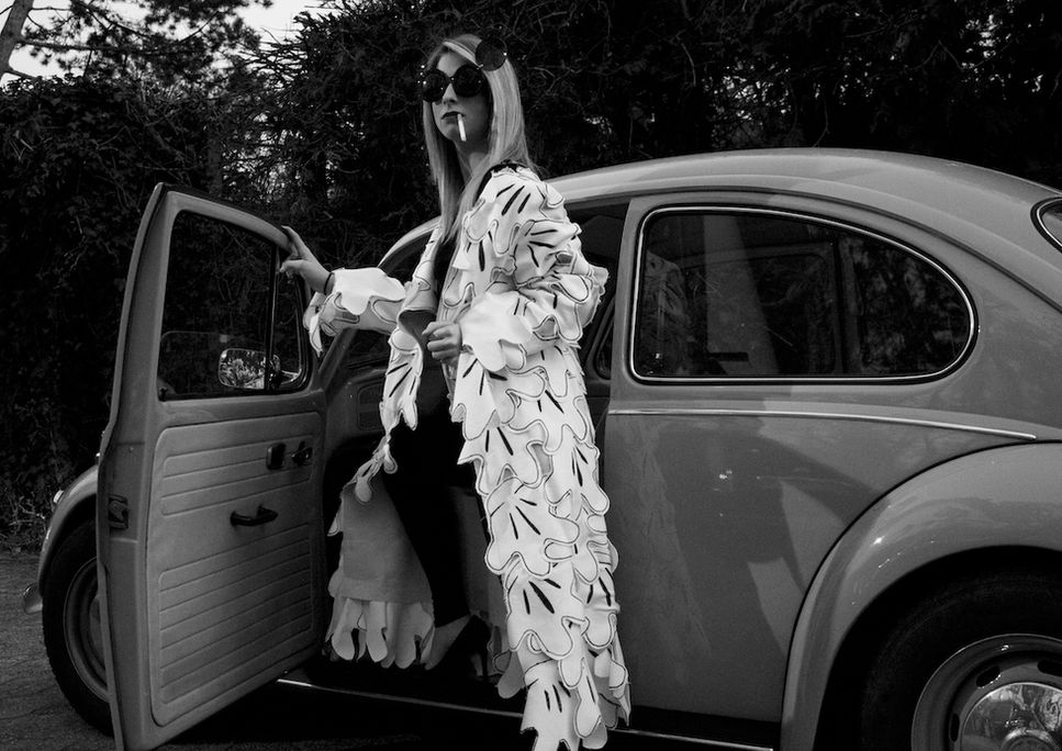 A coat made out of Mickey Mouse's Hands - Pushing the 1969 VW Beetle