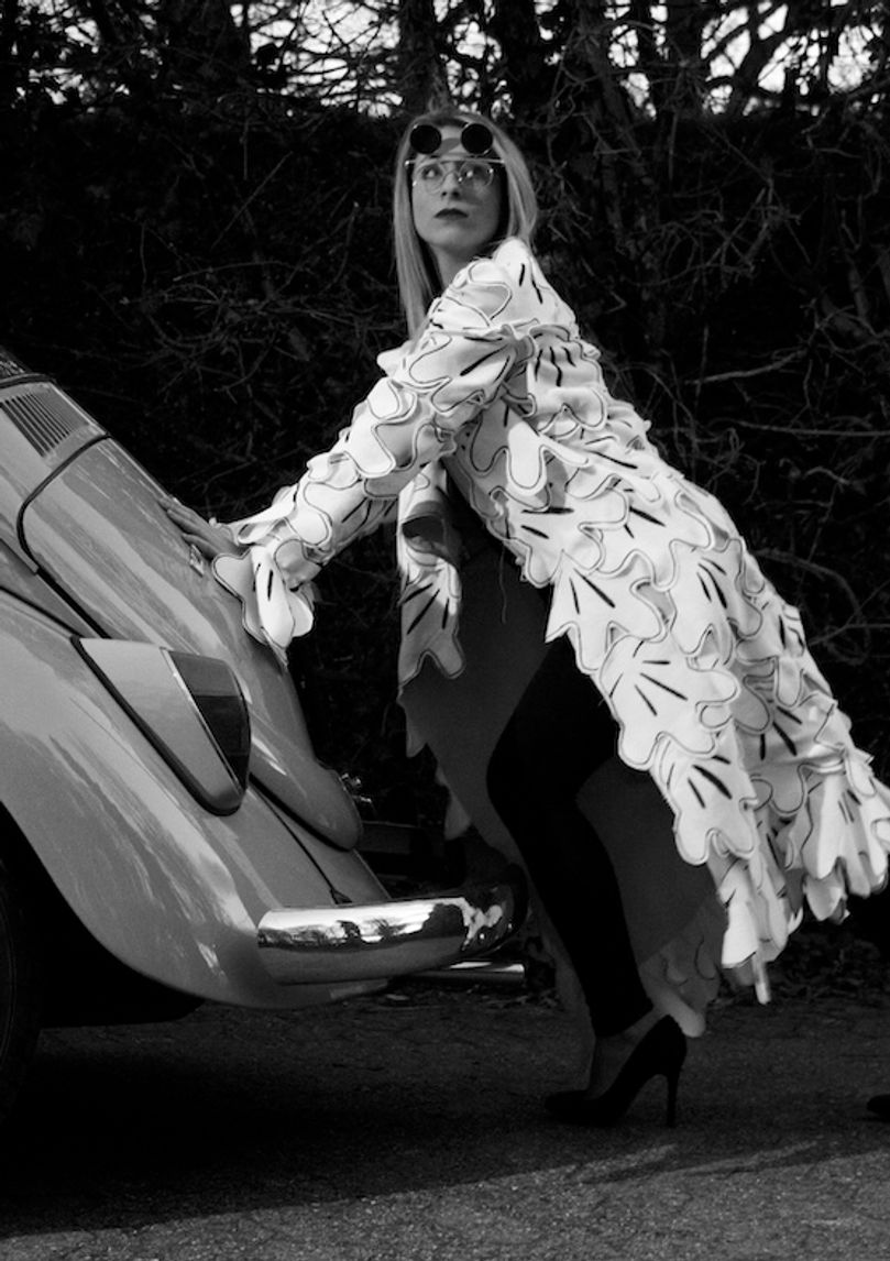 A coat made out of Mickey Mouse's Hands - Pushing the 1969 VW Beetle