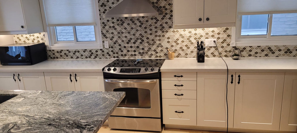 A cleaning of a kitchen in preparation for an open house.jpeg