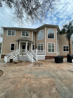 home located in cedar point cleaned by soft wash and pressure washing