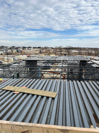 Roof Work to Enclose the Commons Area.jpeg