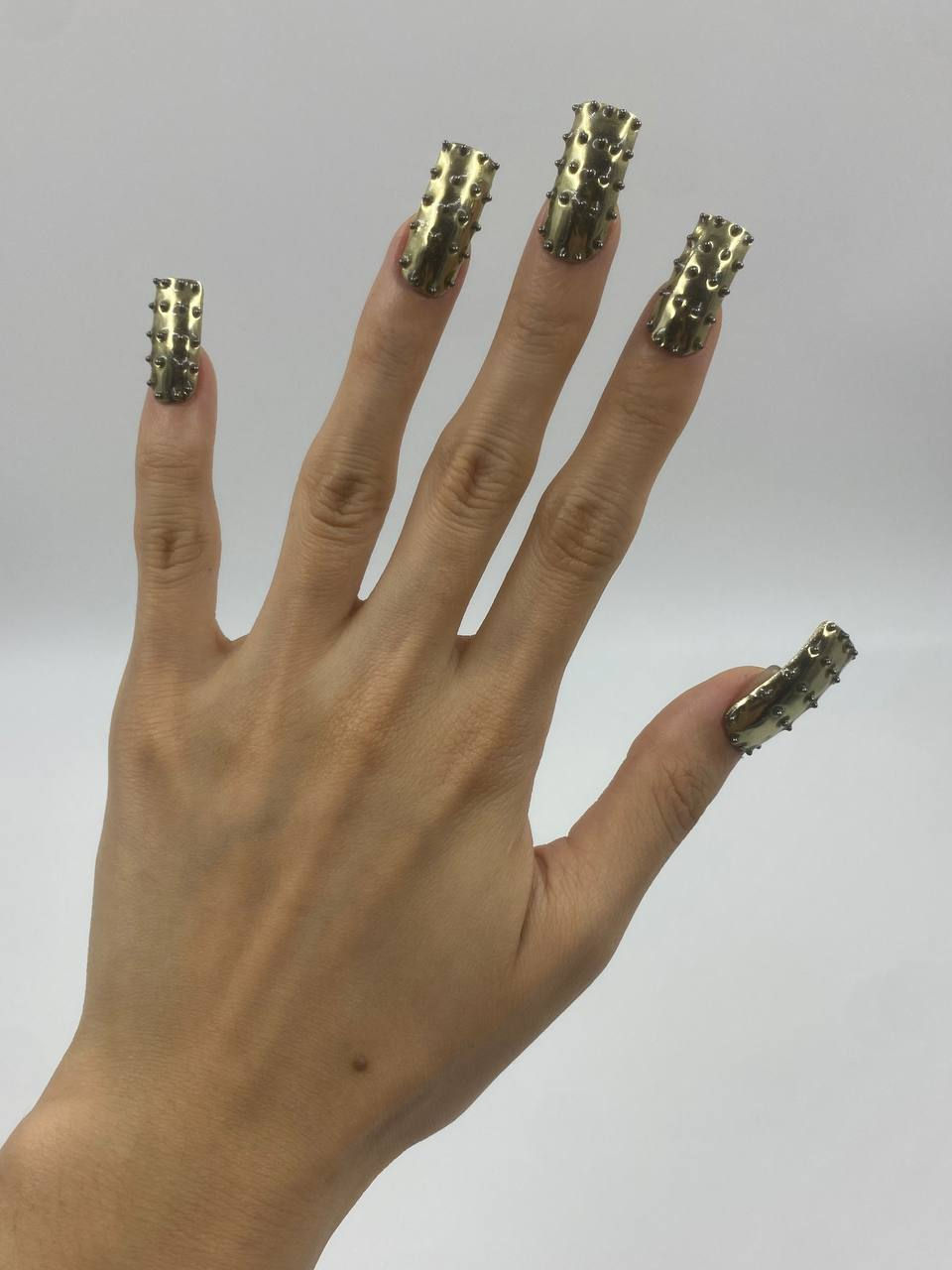 Thumbnail: Metallic Stud Nails