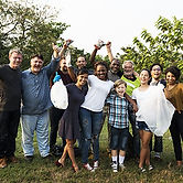 Diverse Group of People Pick Up Trash in The Park Volunteer Community Service.jpg
