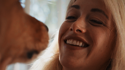 CompanAIn founder with rescue dog candid close up — brand film by Boda Studios Charleston SC