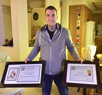 David Hoffman with his 2 diplomas