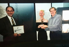 Alan with Michael Good, presenting the new Designer of the Year Award from the American Jewelry Design Council.