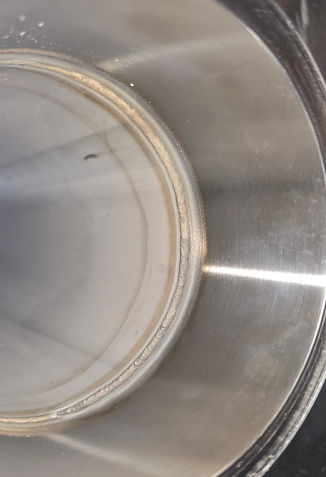 Hygienic flange purge welded to pipe with clean internal weld