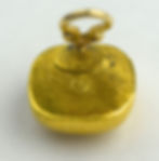 24K gold earring marked "999"