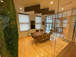 SPACIOUS CONFERENCE ROOM WITH GLASS WALLS