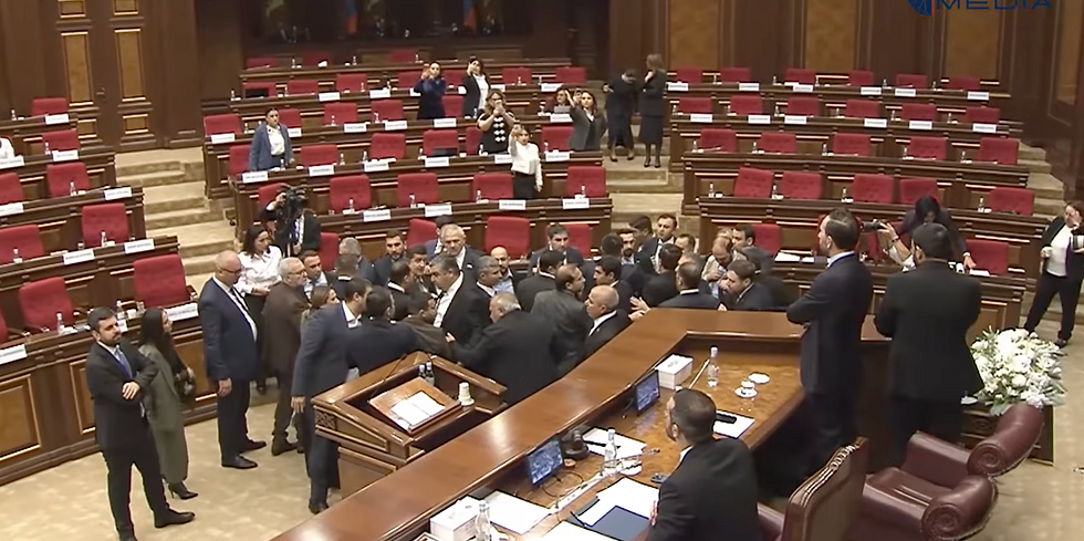 Chairs Thrown, Lawmakers Injured as Violence Erupts in Armenian Parliament