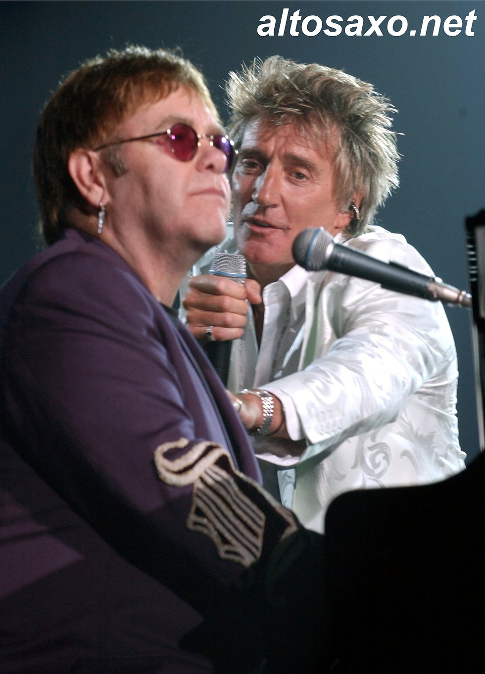 Elton John and Rod Stewart perform at The MGM Grand Hotel and Casino in Las Vegas on September 28, 2002.