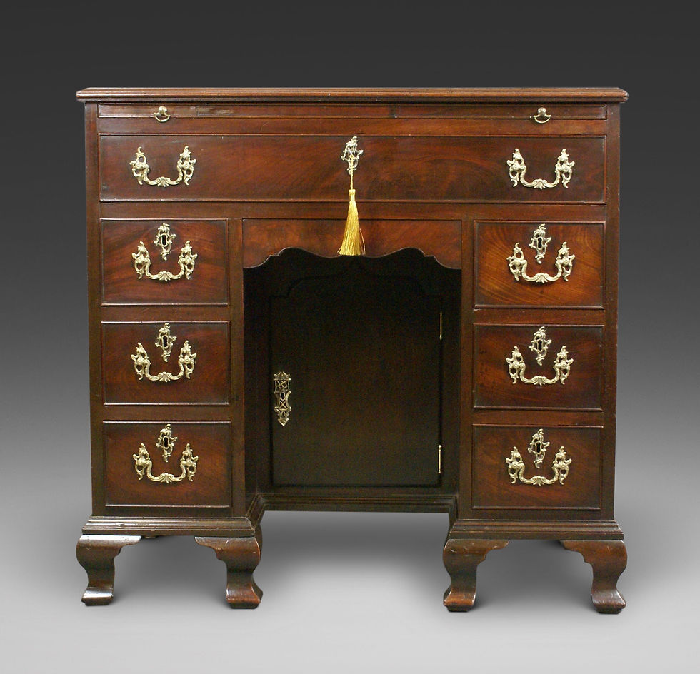 A Cuban Mahogany Knee-Hole Desk.