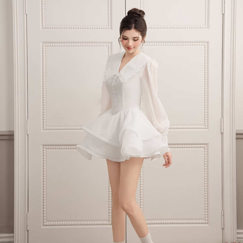 Model wearing white V neck long sleeve flare dress in soft chiffon, layered A-line skirt, feminine, elegant style.