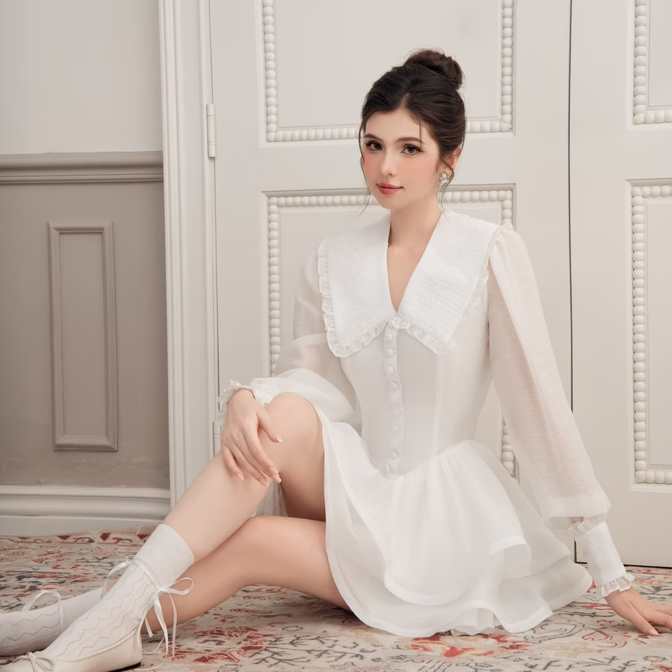 Model wearing white V neck long sleeve flare dress in soft chiffon, layered A-line skirt, feminine, elegant style.
