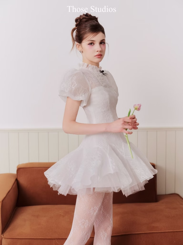 Tessa Dress with puff sleeves and high neck in soft mesh, ideal for dates, picnics, or casual garden parties.
