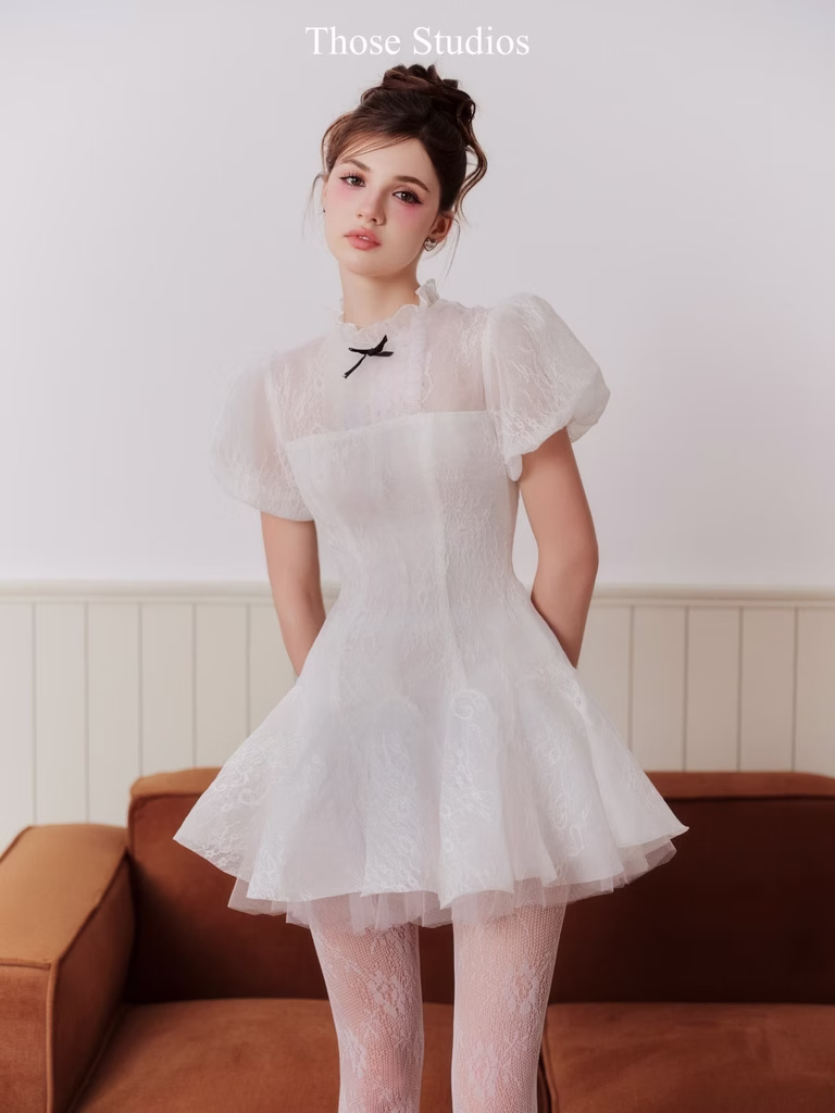 Tessa Dress with puff sleeves and high neck in soft mesh, ideal for dates, picnics, or casual garden parties.