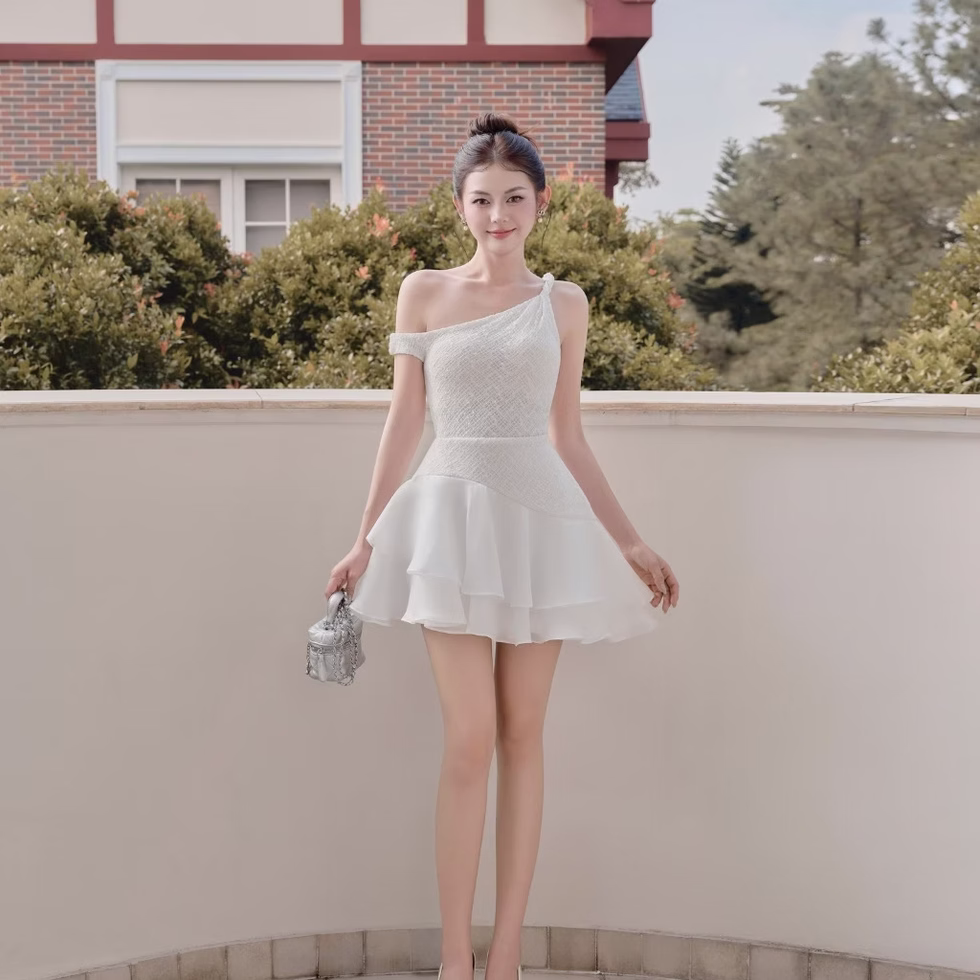 Elegant one-shoulder white mini dress by Those Studios, perfect for parties, dates, photoshoots, and brunches.