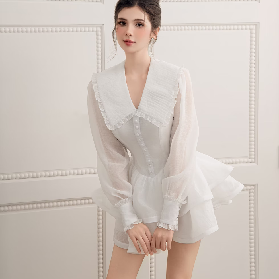 Model wearing white V neck long sleeve flare dress in soft chiffon, layered A-line skirt, feminine, elegant style.