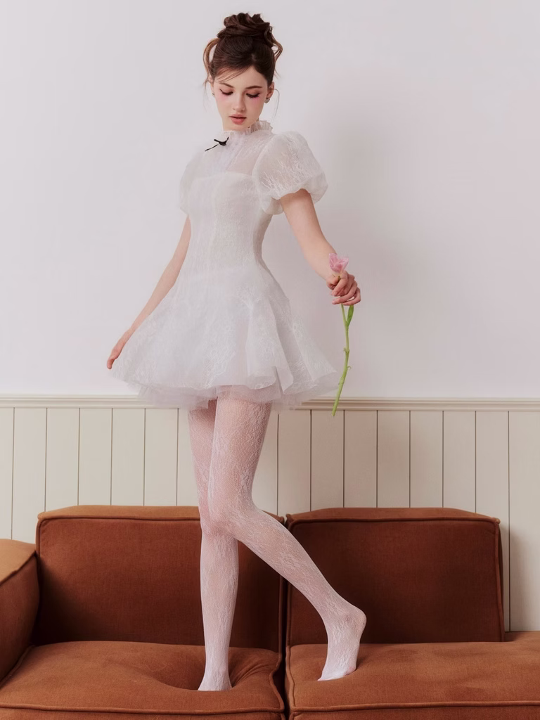 Tessa Dress with puff sleeves and high neck in soft mesh, ideal for dates, picnics, or casual garden parties.