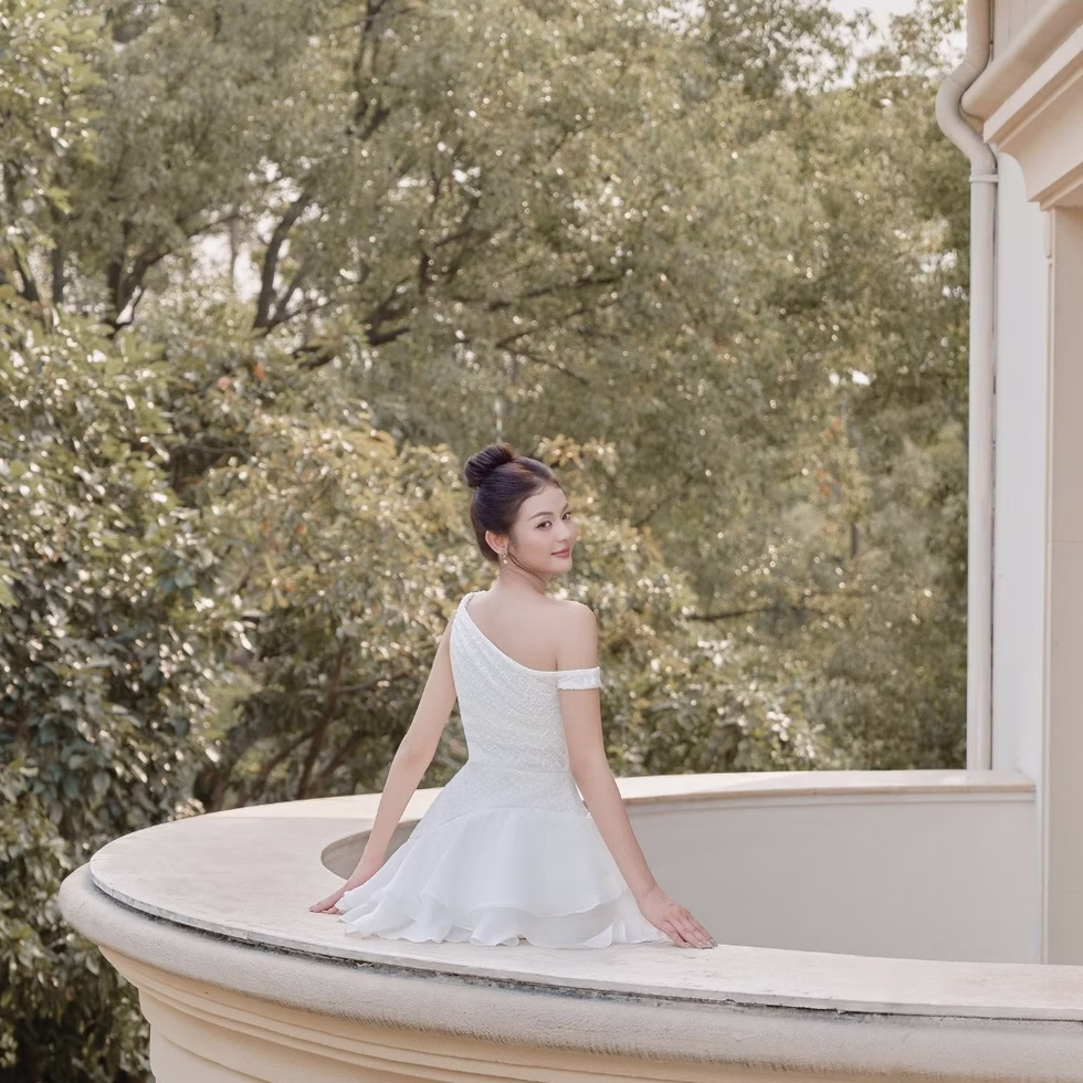 Elegant one-shoulder white mini dress by Those Studios, perfect for parties, dates, photoshoots, and brunches.