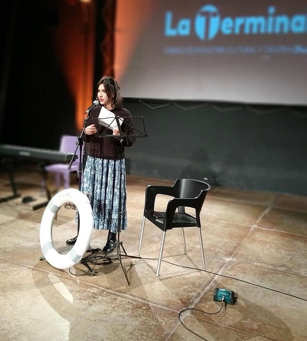Aquí en un festival de poesía