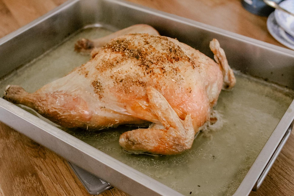 Roast chicken in a pan.