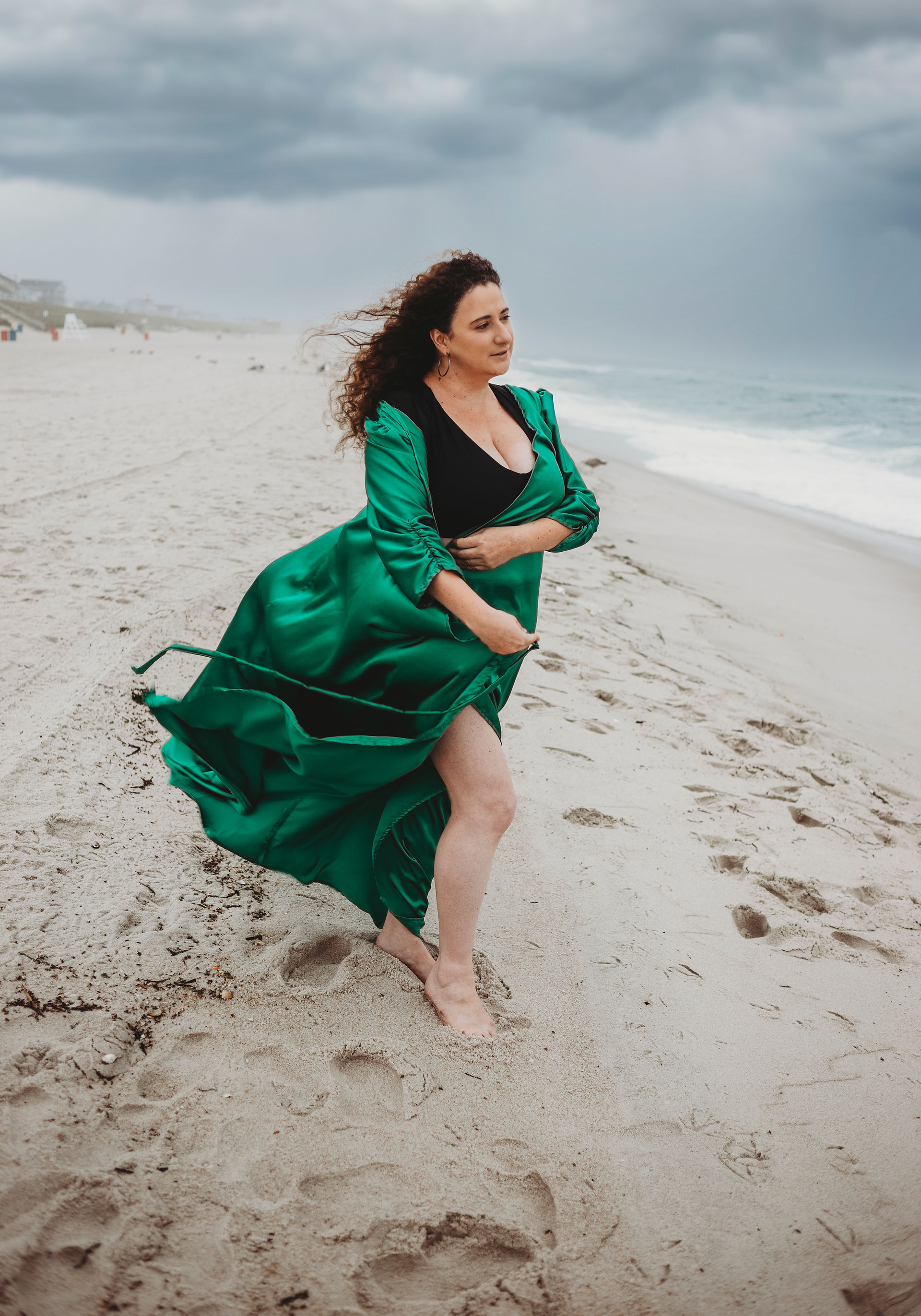 Beach photoshoot of woman in green dress at Jersey Beach NJ