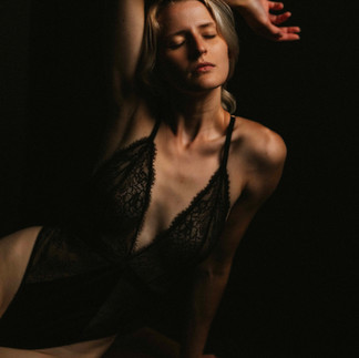 Healing and confidence photoshoot of blond woman in black lingire at Ulster PA photoshoot.