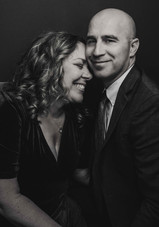 Lucas and Alyssa smiling and laughing during family photoshoot in their upstate New York home. 