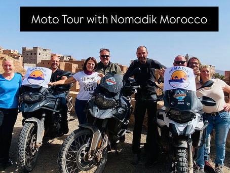 Nomadik Morocco motorcycle tour riders stopping at panoramic viewpoint in the Atlas Mountains