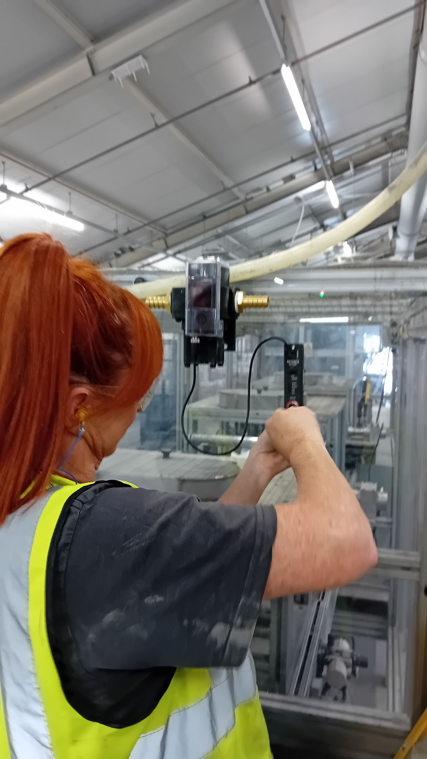 Fifteen air monitoring sensors and ten power monitoring sensors were installed as part of the system. Here, you can see Tanya diligently setting up the network interface.