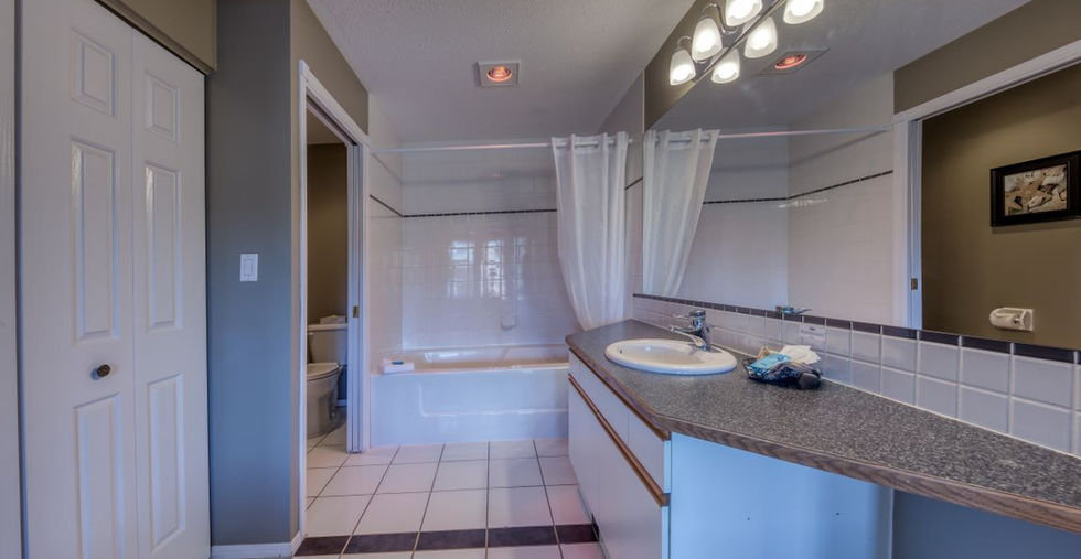 Spacious bathroom with counter space and bath tub at Marble Canyon Phase 1 Unit 702 Fairmont