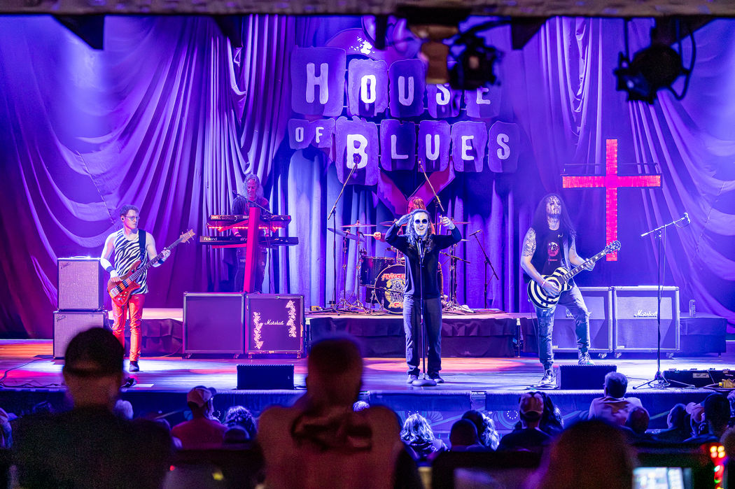 Flying High Again full band performing live with the audience