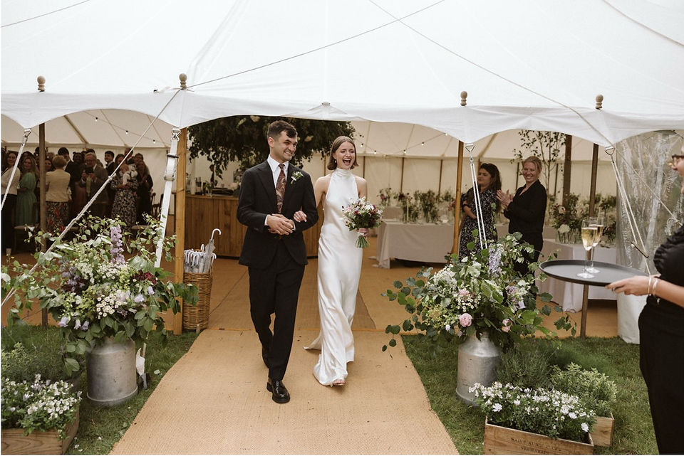 Meg Senior UK Wedding Celebrant | English at-home marquee wedding | Pippa and Alec celebrating