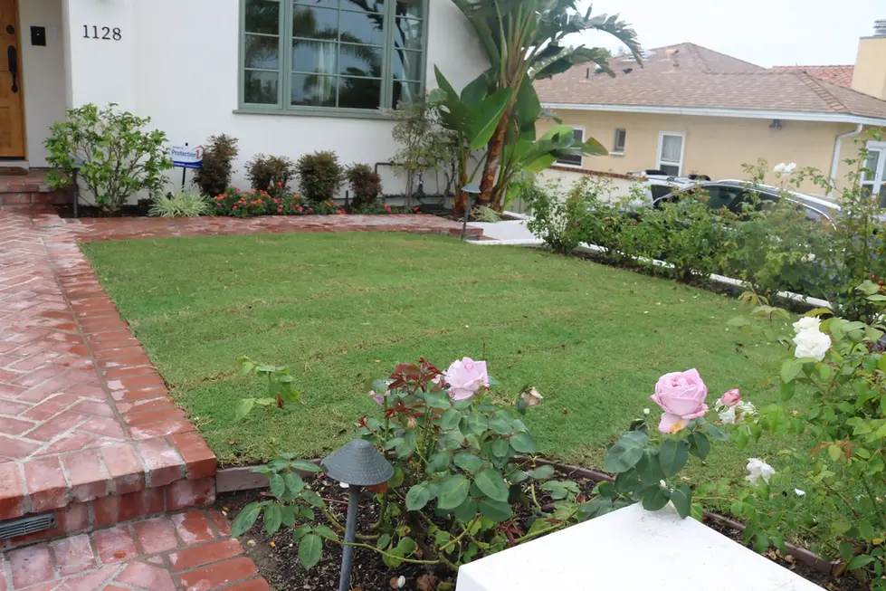 HOME ENTRANCE ENHANCED WITH CLEAN LANDSCAPING – JOE GUILLIAN