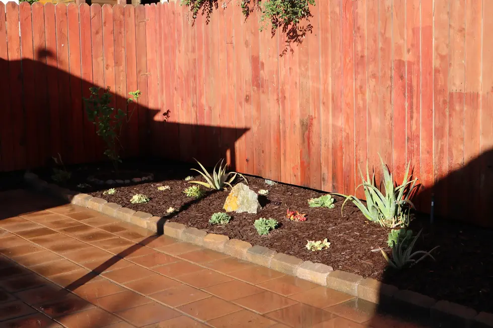 NATURAL STONE RETAINING WALL IN BACKYARD – JASON SONG