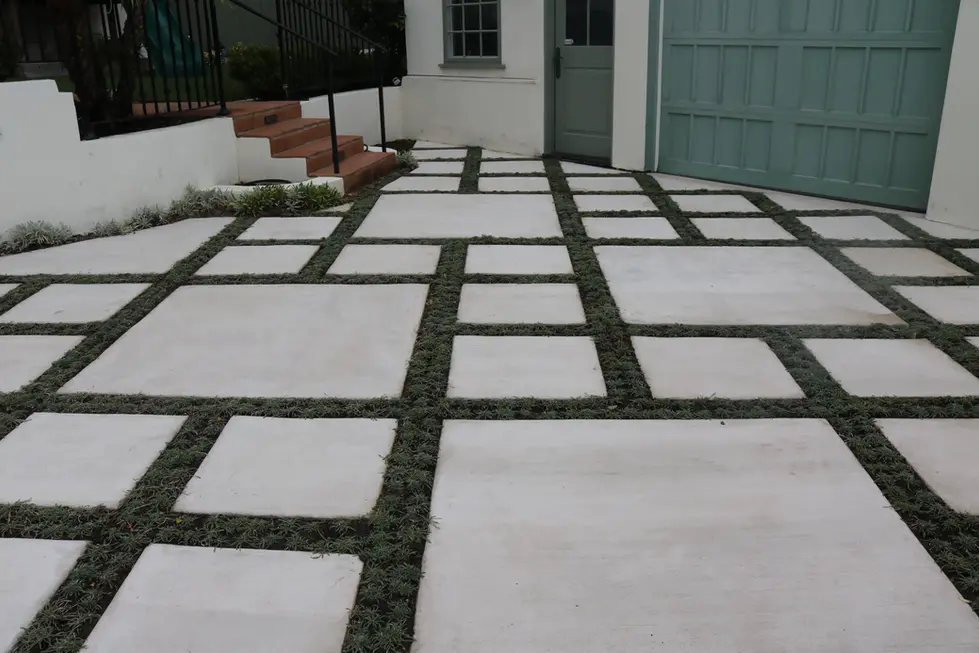 DECORATIVE STONE LANDSCAPE AROUND EXISTING TREE – JOE GUILLIAN