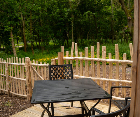 outside deck with dining furniture