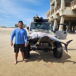 tuna on front of jeep