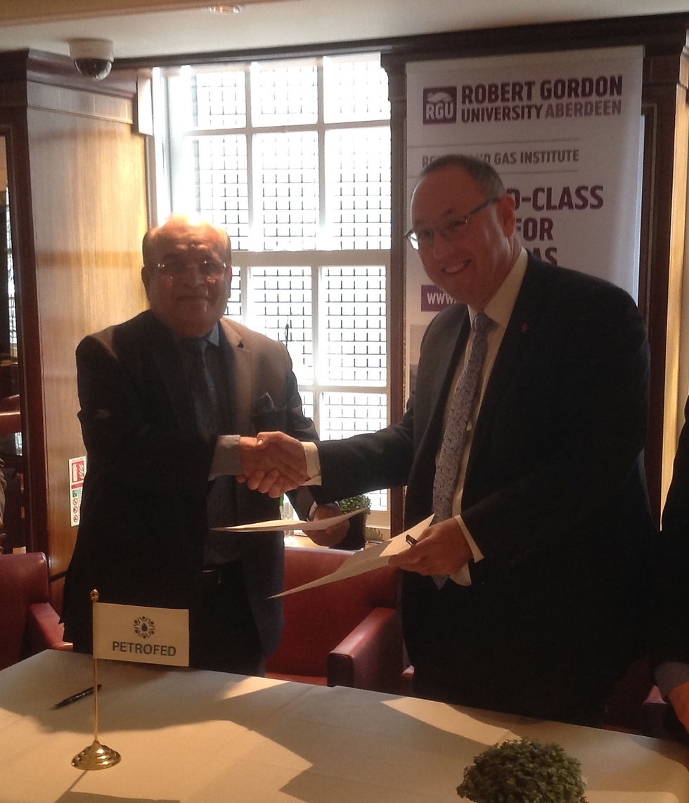 Dr.RK. Malhotra and Prof. Paul signing the MoU