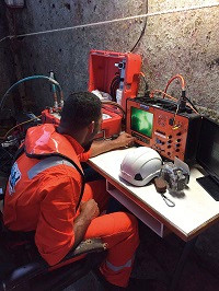 A Hydrex technician monitors the underwater repairs being carried out to the semi-submersible’s 12 sterntube seals