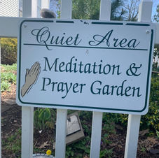Sign in front of garden reading Quiet Area:  Meditation and Prayer Garden