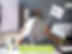 Man sitting at a desk holding his laptop open and on top of his head from digital content overload.